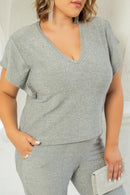 Conjunto plus size brilhante com lurex de calça e blusa com manga soltinha