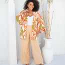 Conjunto feminino plus size de calça alfaiataria lisa com kimono