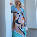 Vestido plus size longo decote em V